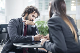 524289419-brownhair-man-woman-working-large