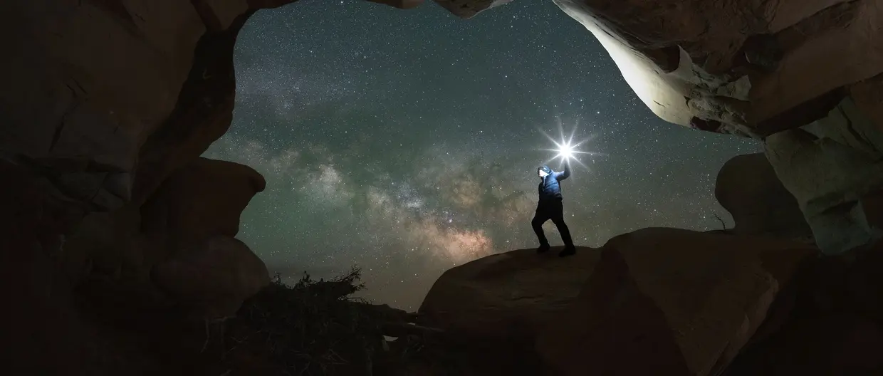 A man walking out of cave