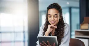 Businesswoman using a tablet