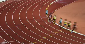 Runners on a curve of the track.