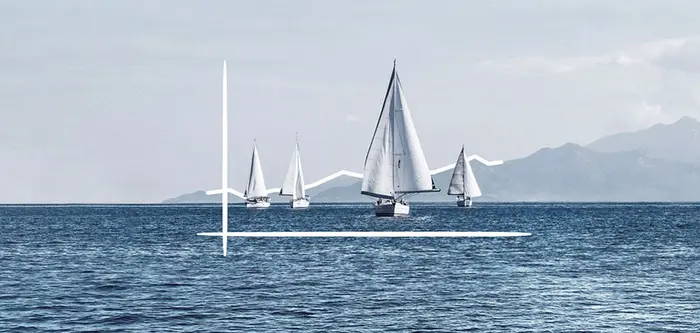 foto di barche a vela sul mare con montagne in lontananza e icona di un grafico bianco