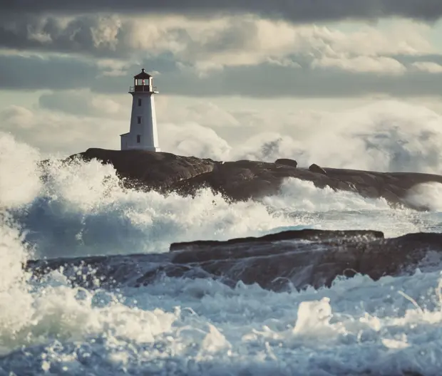 Lighthouse in surf