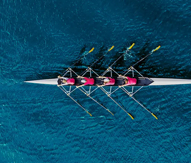 Rowing team in a race