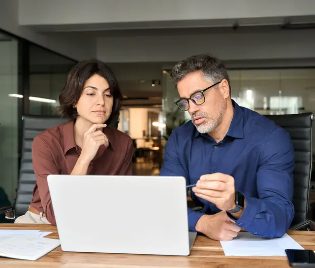 financial specialists working with documents