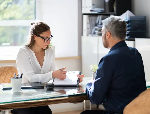 financial advisor advising client