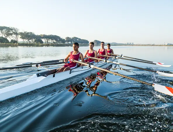 Team of rowers on water