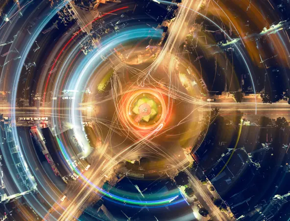 aerial view of road junction with lights