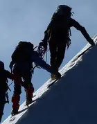 ARA - Private Equity - three-men-climbing-a-snow-covered-mountain