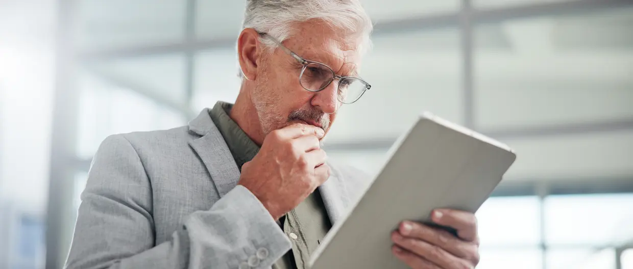 50 years old man thinking about his retirement plan