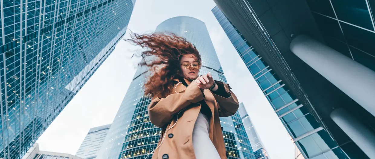 woman looking at her watch