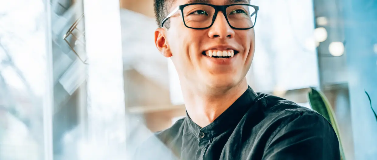 young entrepreneur, smiling and looking forward to the future