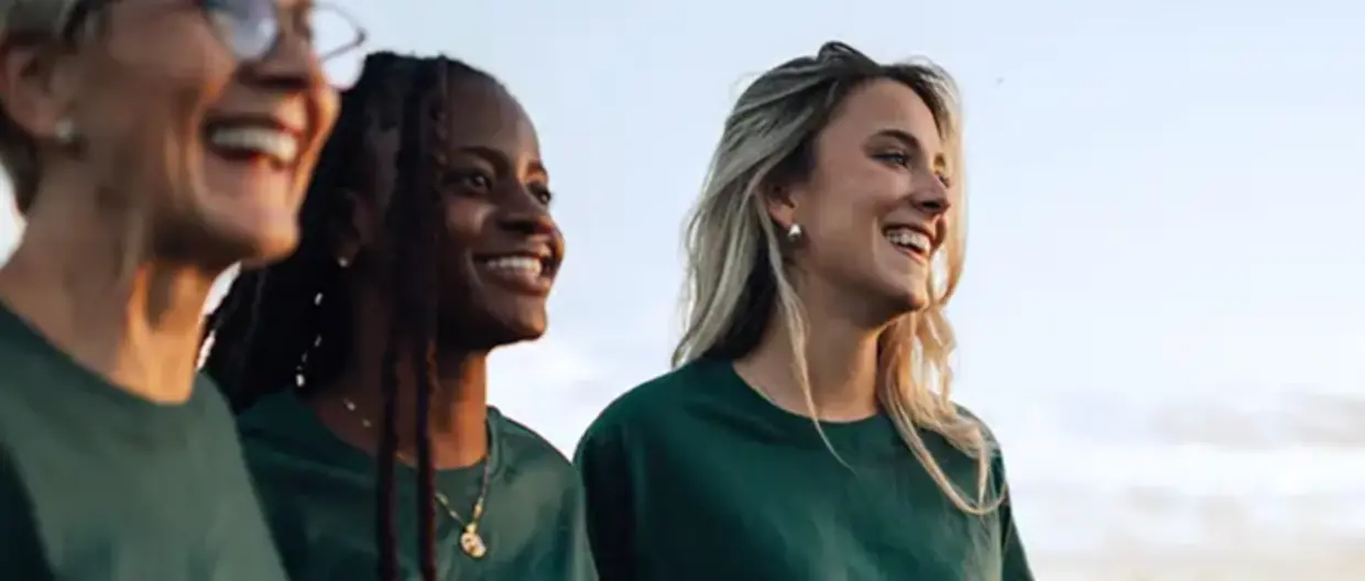 3 women looking in the distance