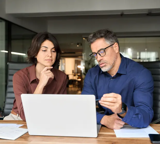 financial specialists working with documents