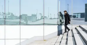 man walking down stairs