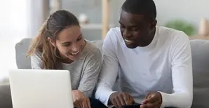 couple calculating their budget
