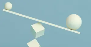Des boules en équilibre sur une planche
