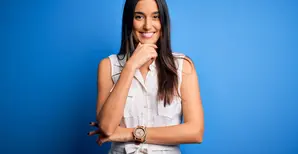 woman smiling, blue background