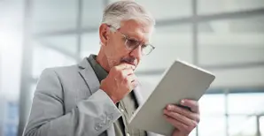 50 years old man thinking about his retirement plan