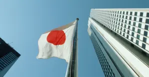 Japan Flag and Buildings from below 