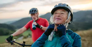 retired couple cycling 