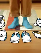 Choisir une paire de chaussures parmi cinq autres