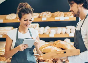 Two bakers with bread