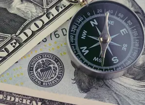 fed_federal_reserve_of_us_government_direction_on_interest_rate_concept_compass_on_us_dollar_banknote_with_feral_reserve_emblem.jpg