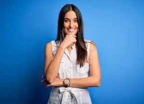 woman smiling, blue background