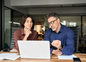 financial specialists working with documents