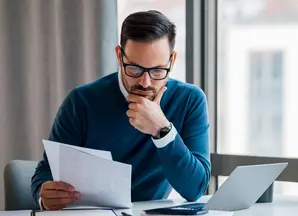 financial specialist working with documents