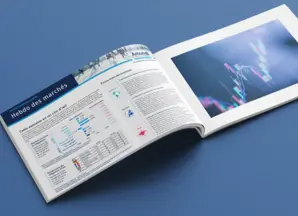 Une brochure ouverte sur un article intitulé 'Hebdo des marchés'