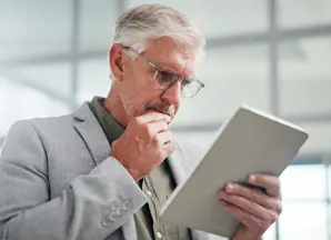 50 years old man thinking about his retirement plan