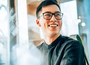 young entrepreneur, smiling and looking forward to the future