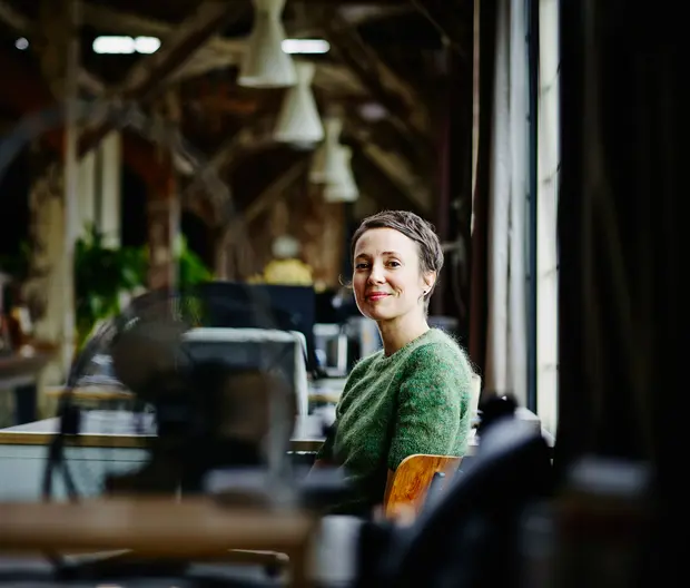 a girl sitting in office