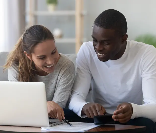 couple calculating their budget