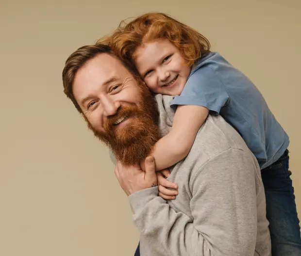 Father and his kid smiling 