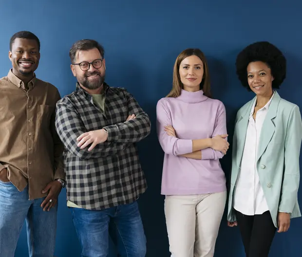 group of 4 people in front of a blue background