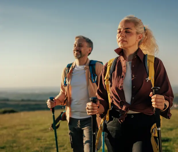 middle aged couple hiking