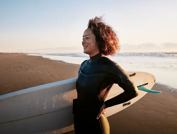 surfer girl on a beach