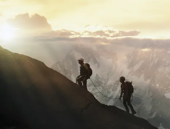 people climbing a mountain