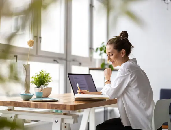 woman working on her laptop