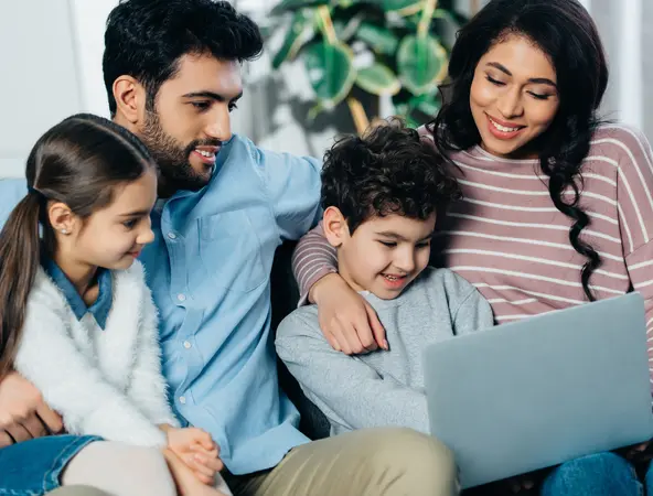 family looking a their computer