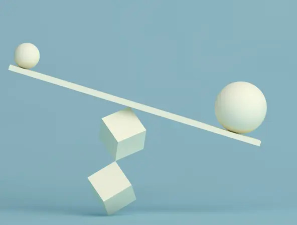Des boules en équilibre sur une planche