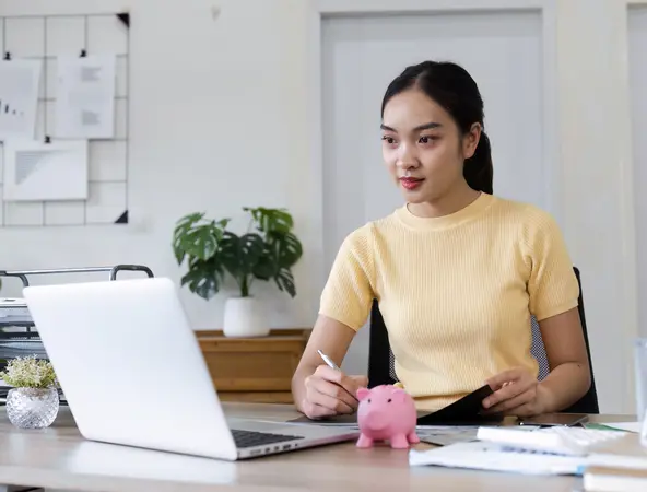 woman looking at her laptop 