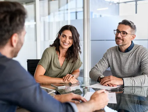 couple meeting financial advisor for investment