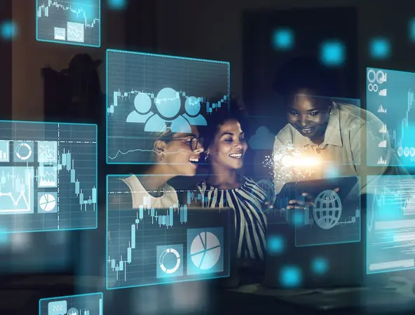 Des jeunes filles devant des écrans technologiques 