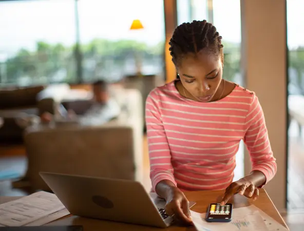 young woman counting her savings