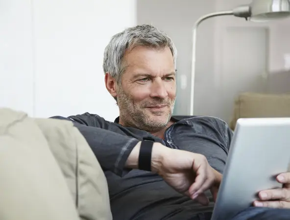 Portrait of man sitting on couch 