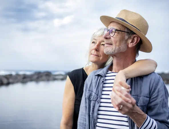 Couple 60s looking at the horizon