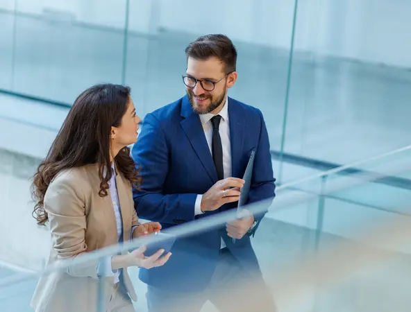 two coworkers talking